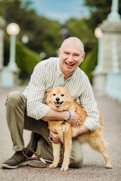 Photo of Roberto Rigobon and his dog