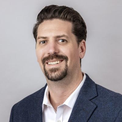 Headshot of Lawrence Schmidt