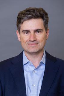 Headshot of Alexi Savov