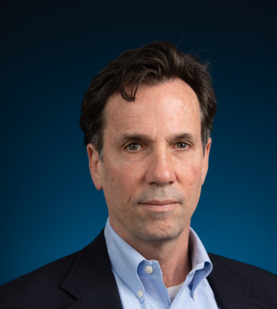 Headshot of Thomas C. Buchmueller